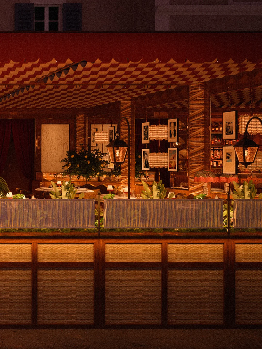 Felino restaurant in Saint-Tropez features a vibrant checkered ceiling, ambient lighting, and lush greenery.