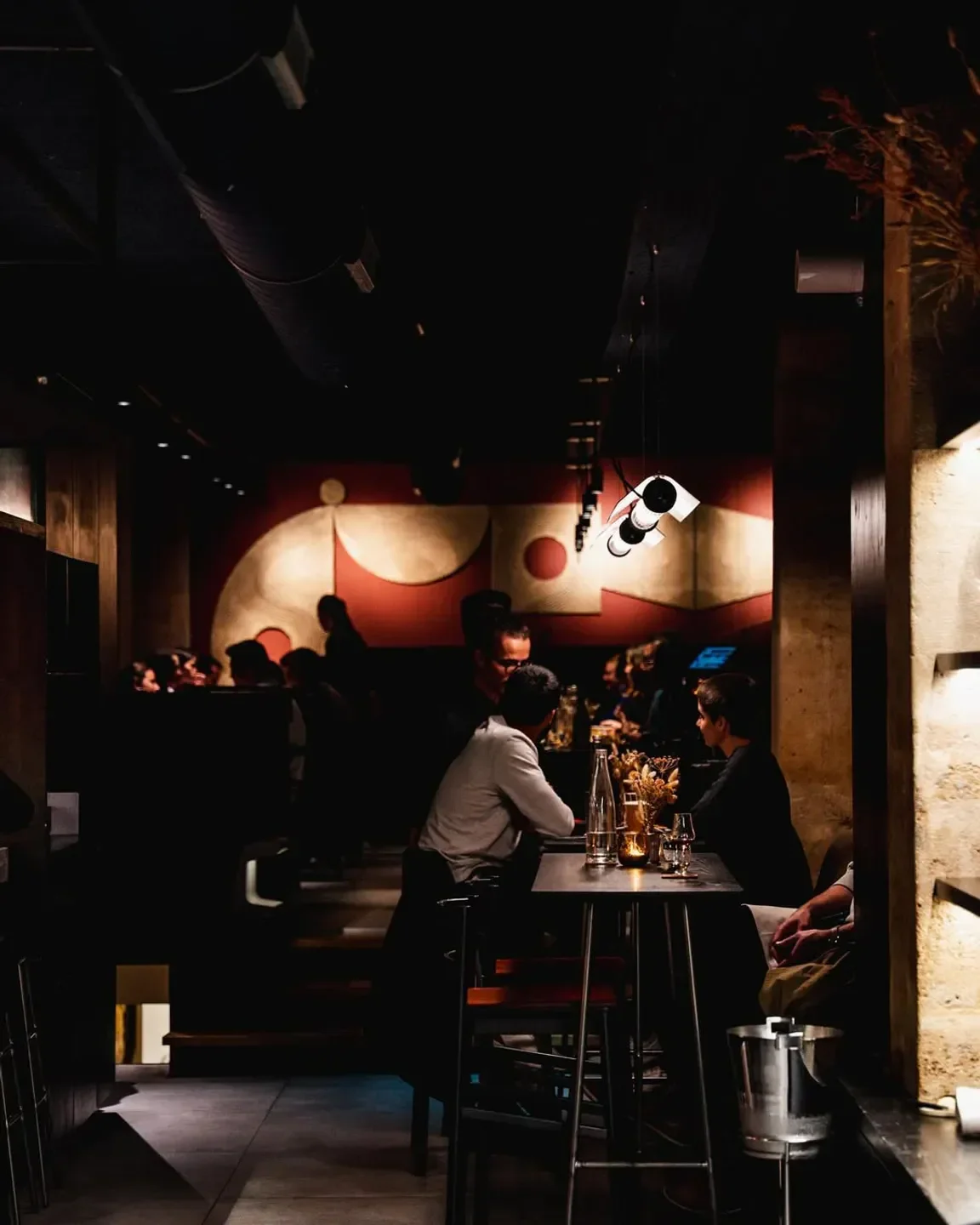 Interior view of FIEF restaurant in Paris, featuring diners and modern decor.