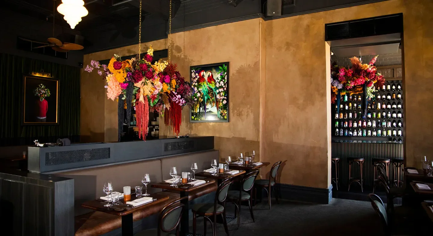 Interior of Fleur at The Royal restaurant in Perth, featuring elegant decor and floral displays.
