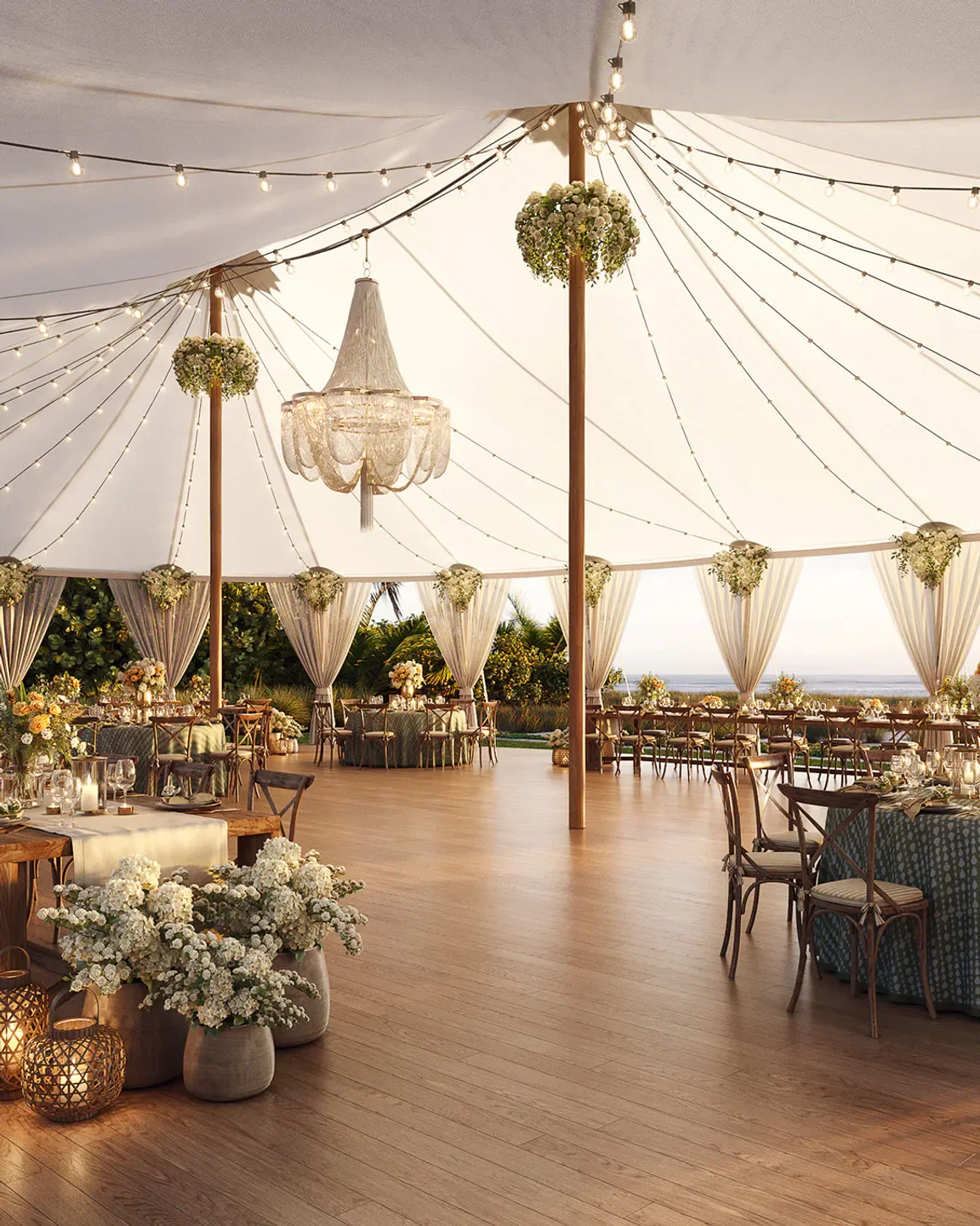 Elegant wedding reception at Flybridge in Palm Beach, featuring chandelier and floral decor