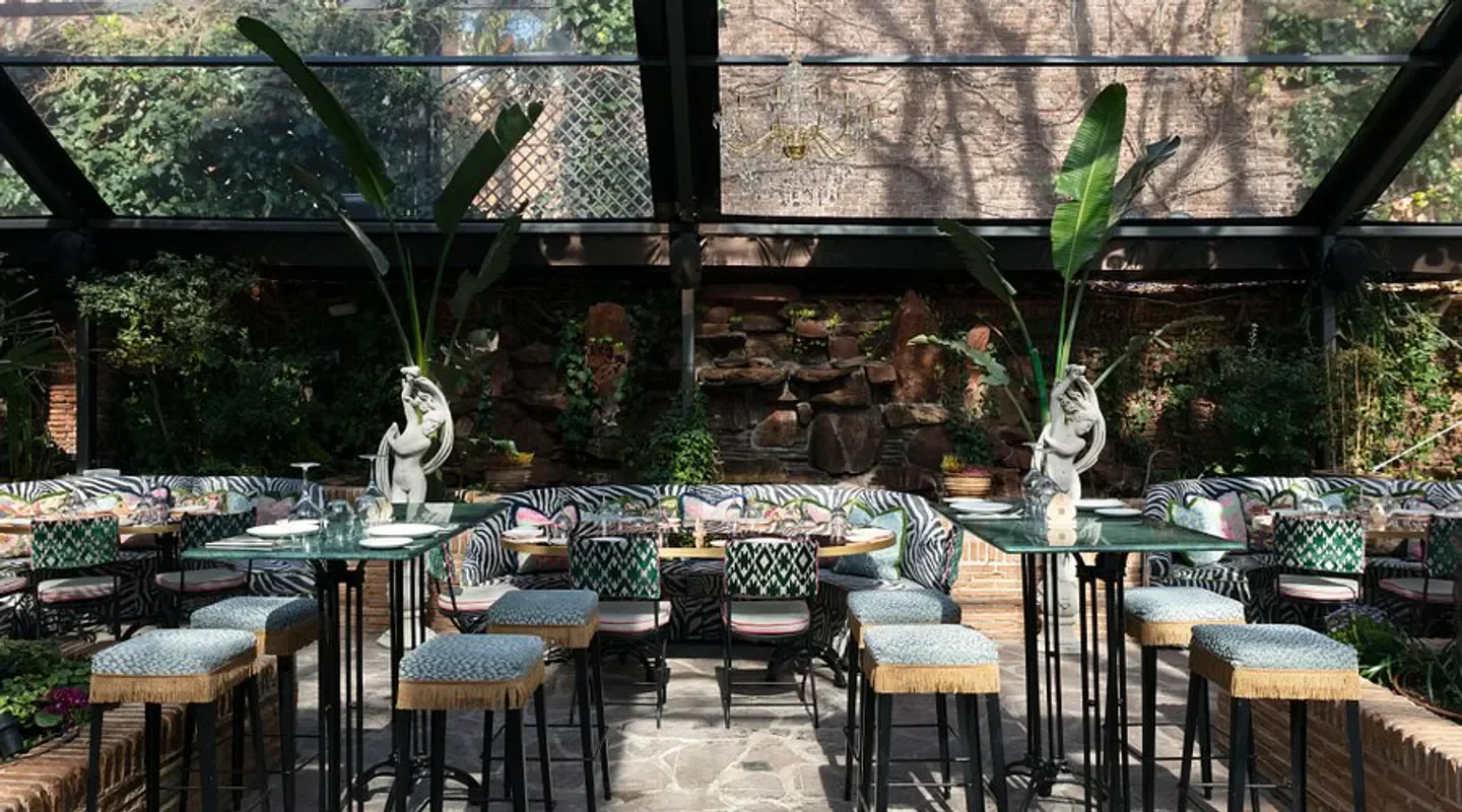 Stylish dining area at Fortuny restaurant in Madrid, with unique decor and ambiance.