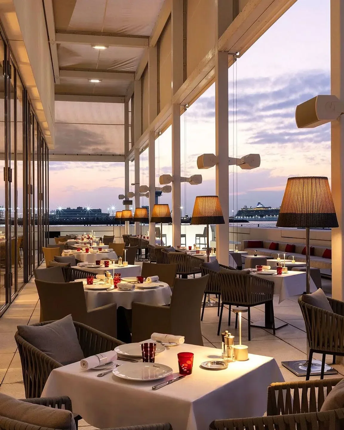 Outdoor dining at Fouquet's Abu Dhabi with sunset views and waterfront ambiance.