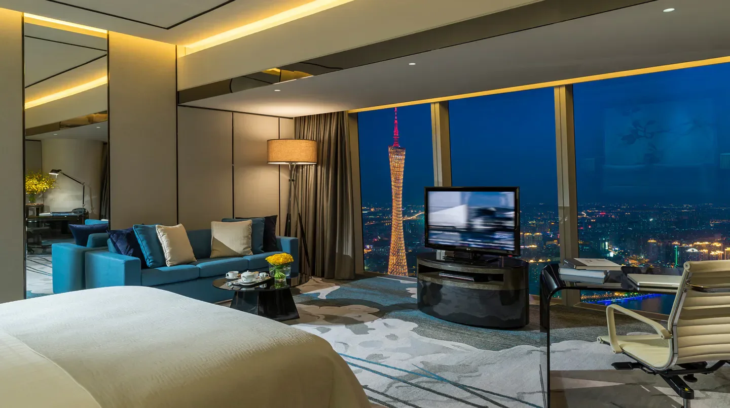 Luxury hotel room with views of Guangzhou skyline at the Four Seasons Hotel Guangzhou.
