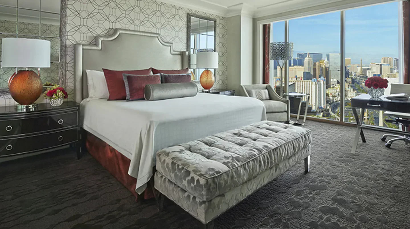 Luxury bedroom at Four Seasons Hotel Las Vegas with city views of Las Vegas.