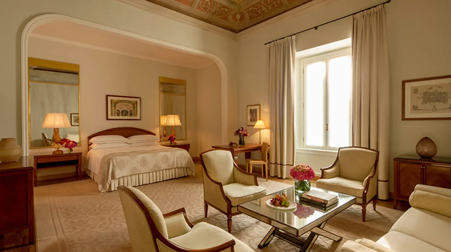 Elegant bedroom at the Four Seasons Hotel Milano, a luxury hotel in Milan