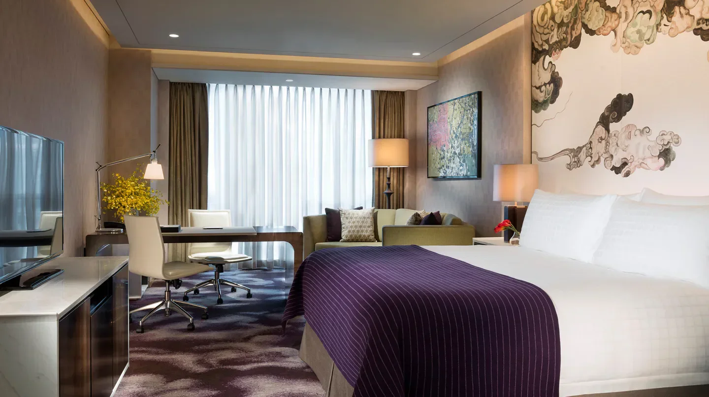 Luxury room at Four Seasons Hotel Shenzhen, featuring elegant design and comfortable furnishings