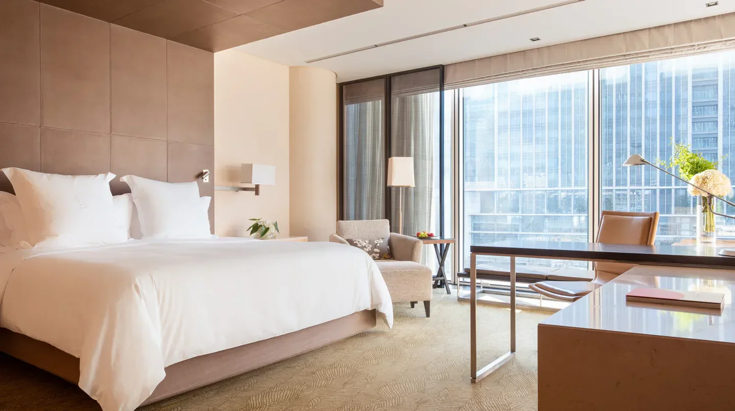Luxury hotel room at Four Seasons Hotel Tokyo at Marunouchi, with views of Tokyo.