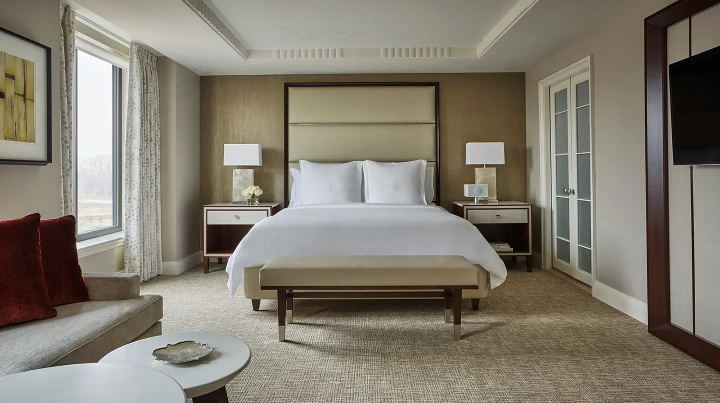 Elegant bedroom at Four Seasons Hotel Washington, D.C. with city views in Washington.