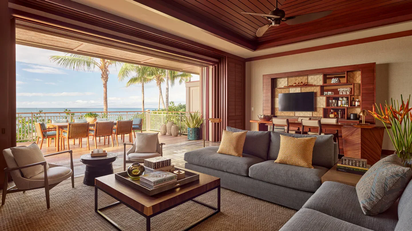Interior living area with ocean view at the Four Seasons Resort Hualalai in Maui.