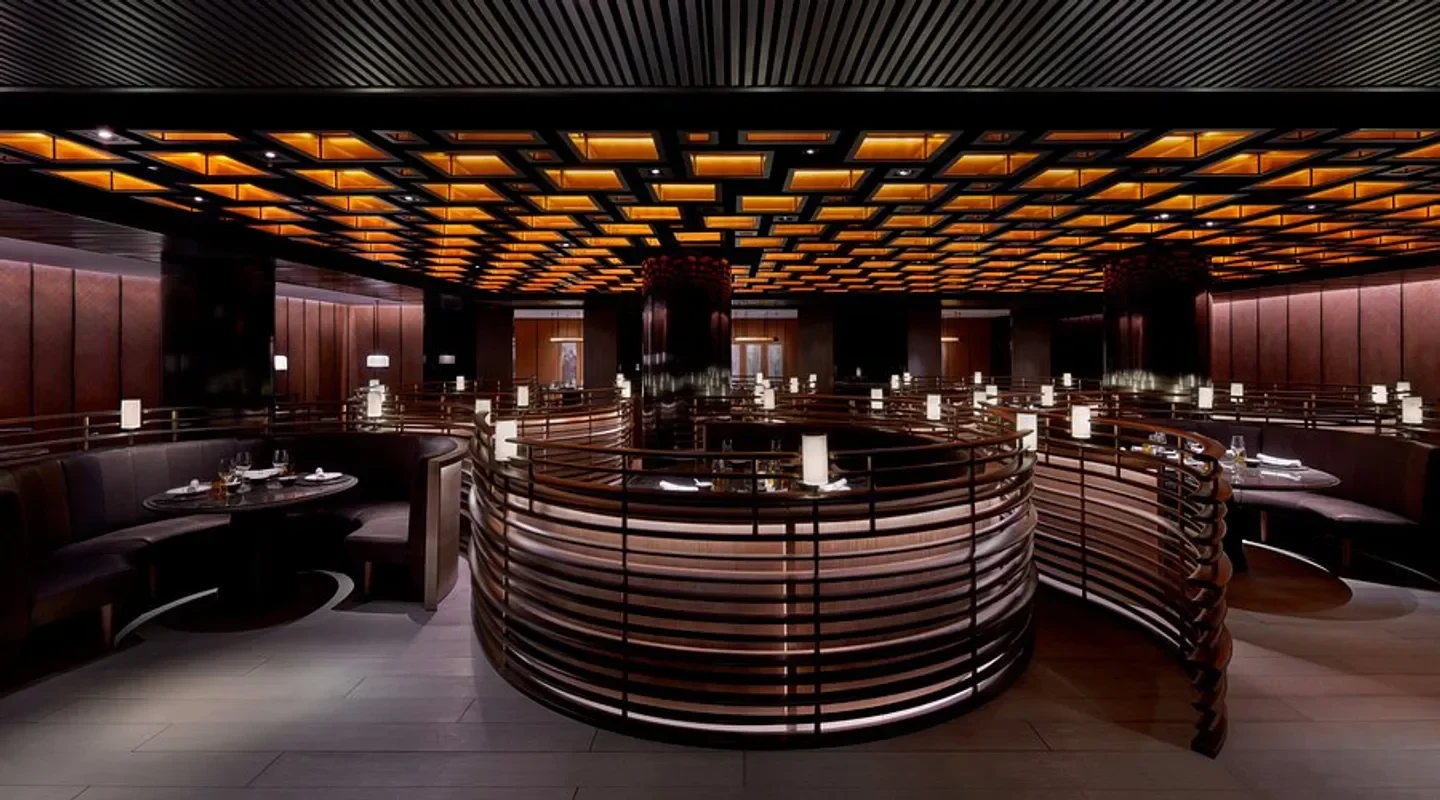 Interior of Fu Chun Ju restaurant in Beijing, featuring modern design and unique seating.