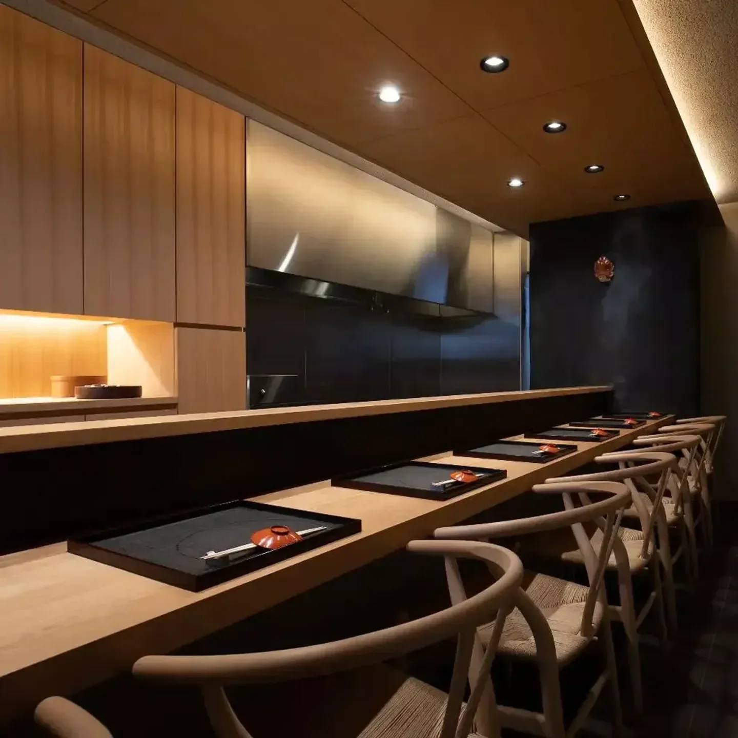 Interior of Funaokayama Shimizu restaurant in Kyoto, featuring sushi bar and wooden decor.