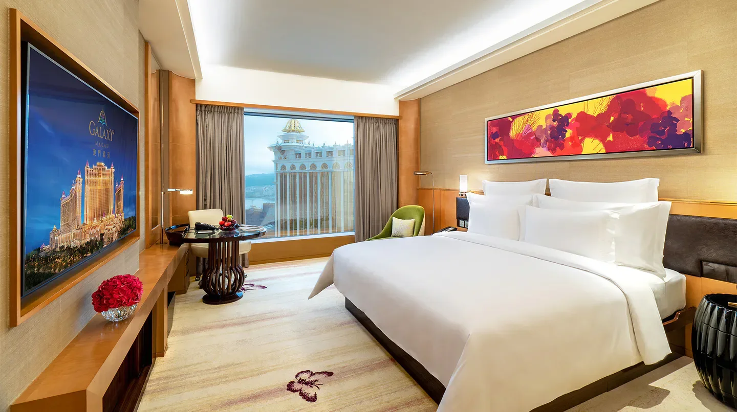 Luxury hotel room at Galaxy Hotel Macau with city views and modern decor