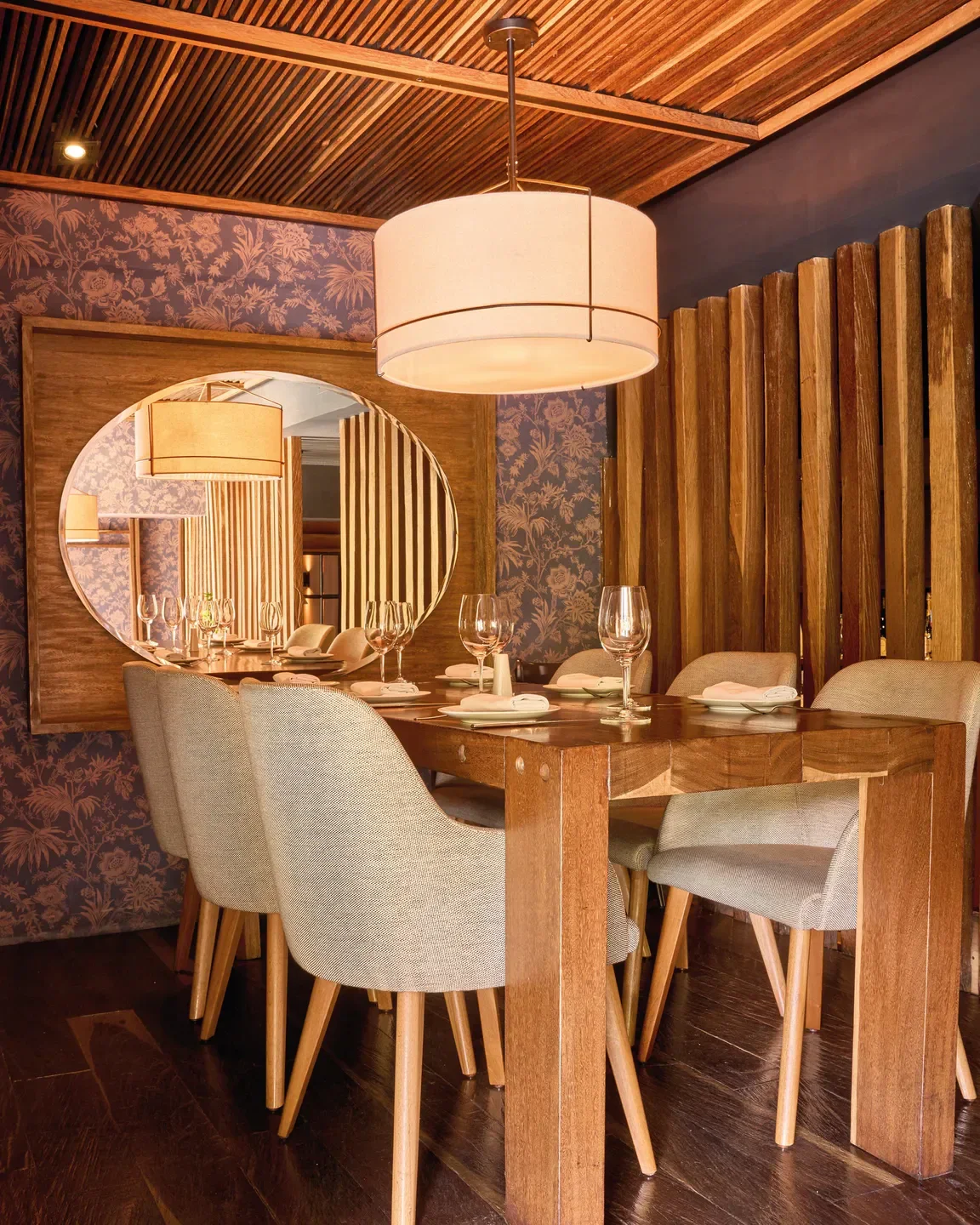 Cozy dining area at Gamberro restaurant in Bogota, featuring elegant table setting.