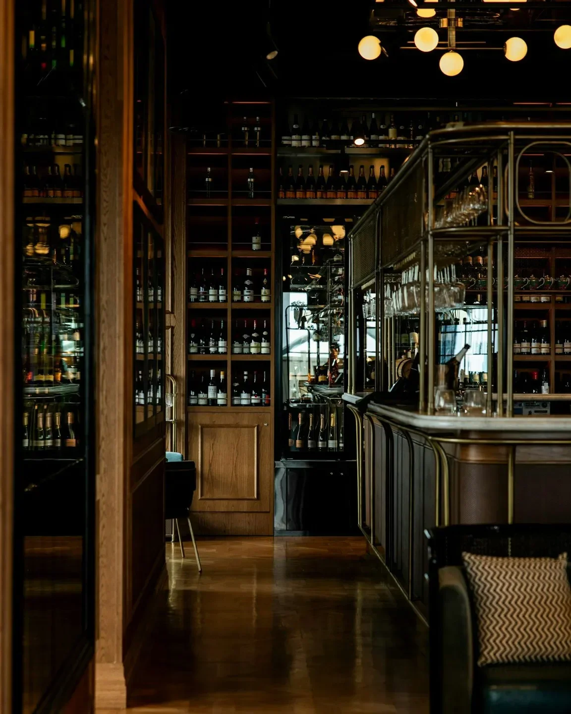 Interior view of Garcon Bleu restaurant in Adelaide with wine selection and bar.