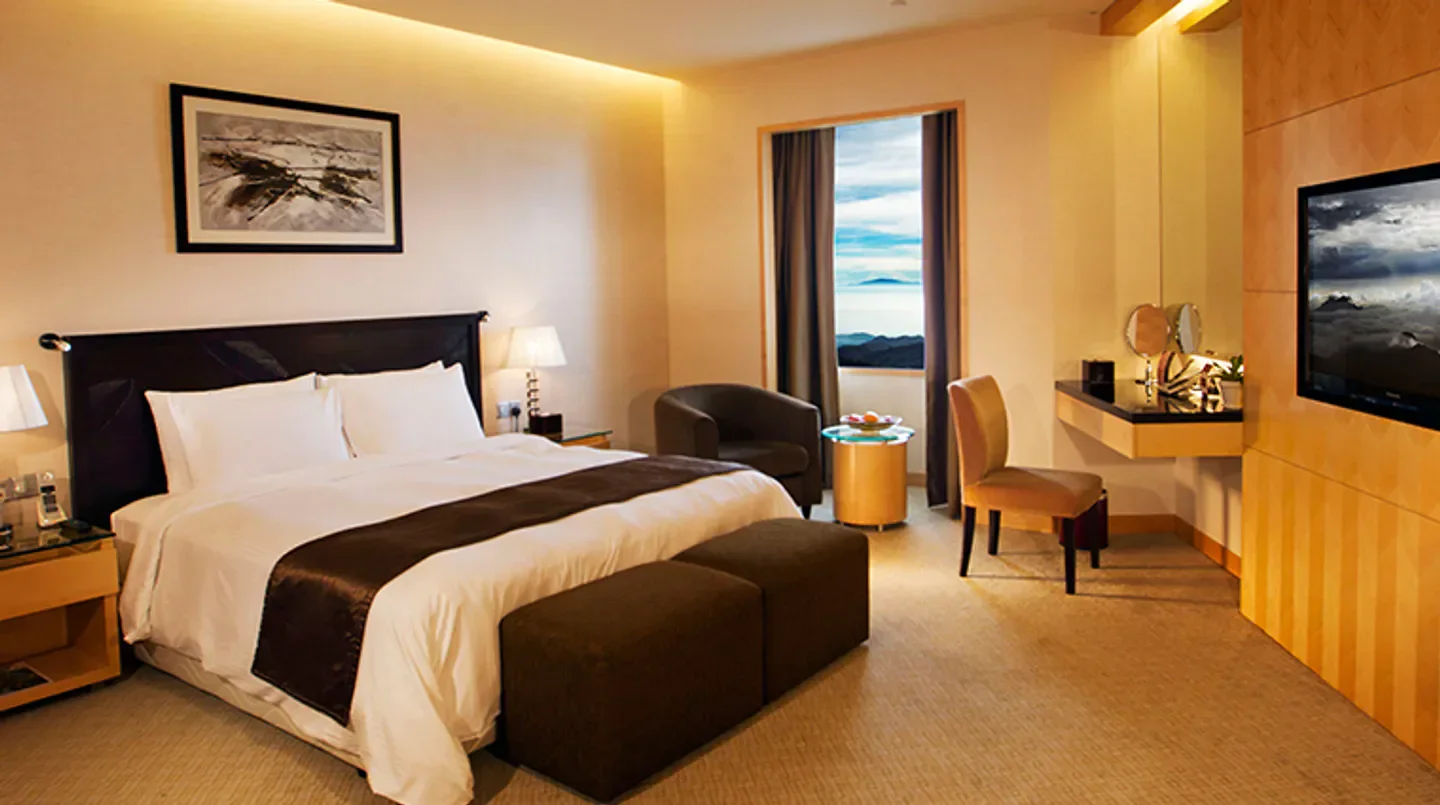 Elegant hotel room at Genting Grand at Resorts World Genting, Kuala Lumpur, with mountain views