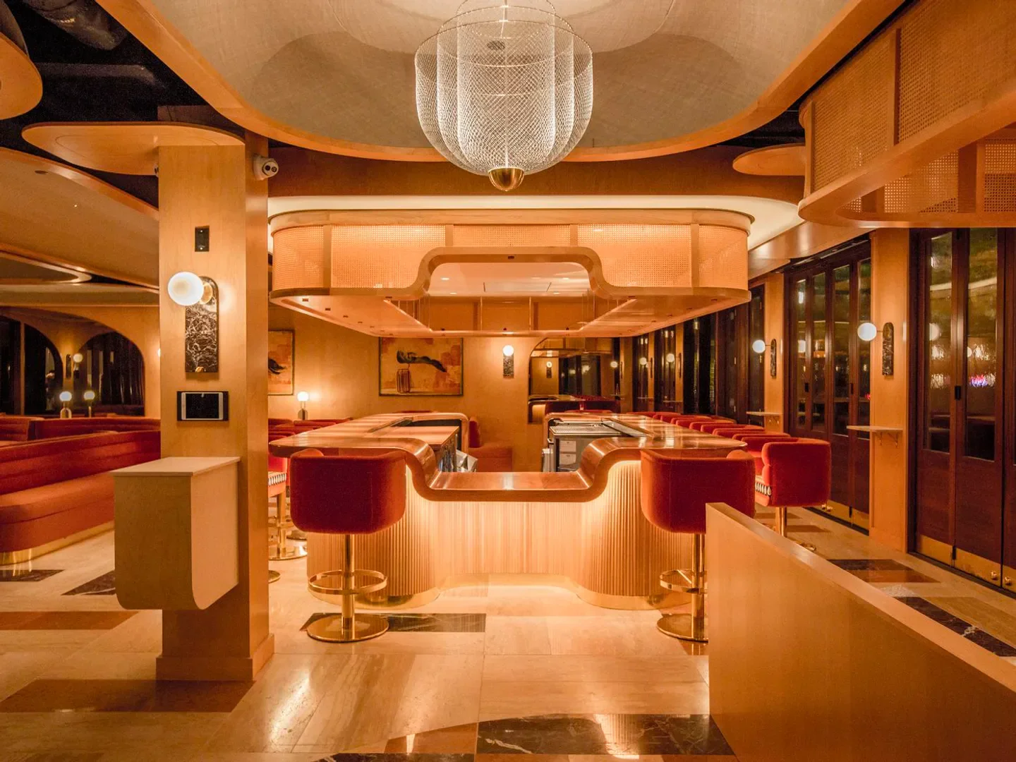 Interior of Georgie by Curtis Stone in Dallas, featuring a stylish bar and seating.