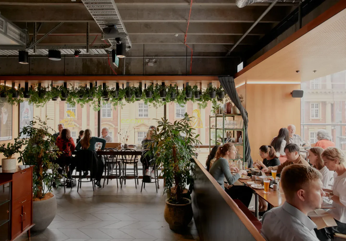 Inside Gochu restaurant in Auckland with diners enjoying a meal at the tables.