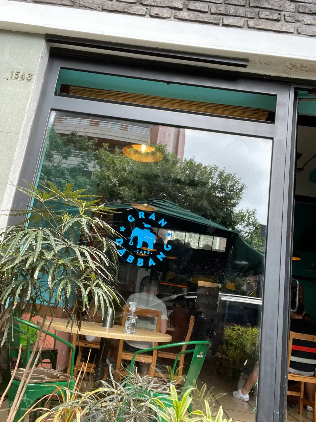 Gran Dabbang restaurant in Buenos Aires, outdoor seating by the window.
