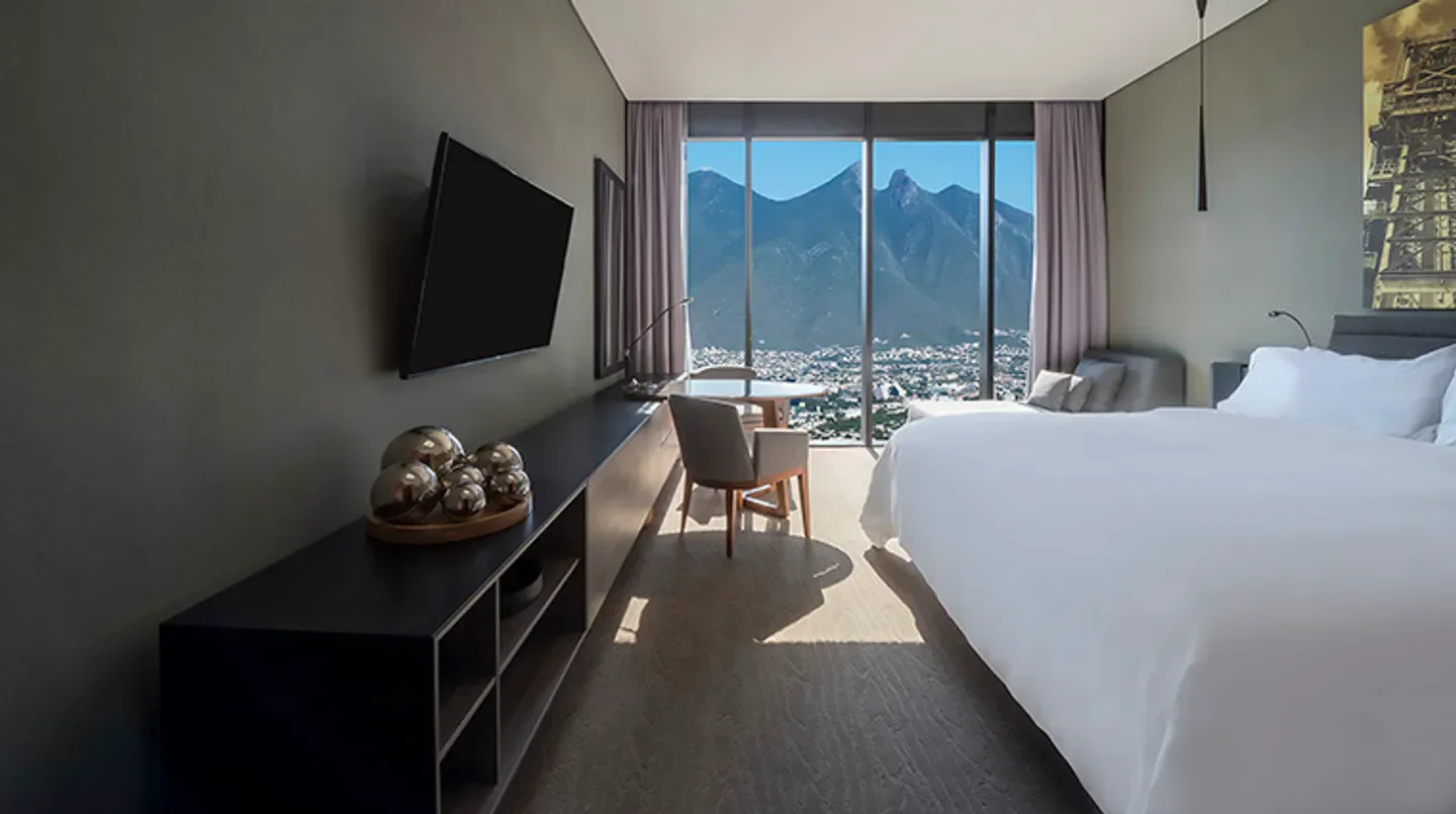 Modern hotel room at Grand Fiesta Americana Monterrey Valle with mountain views in Monterrey.