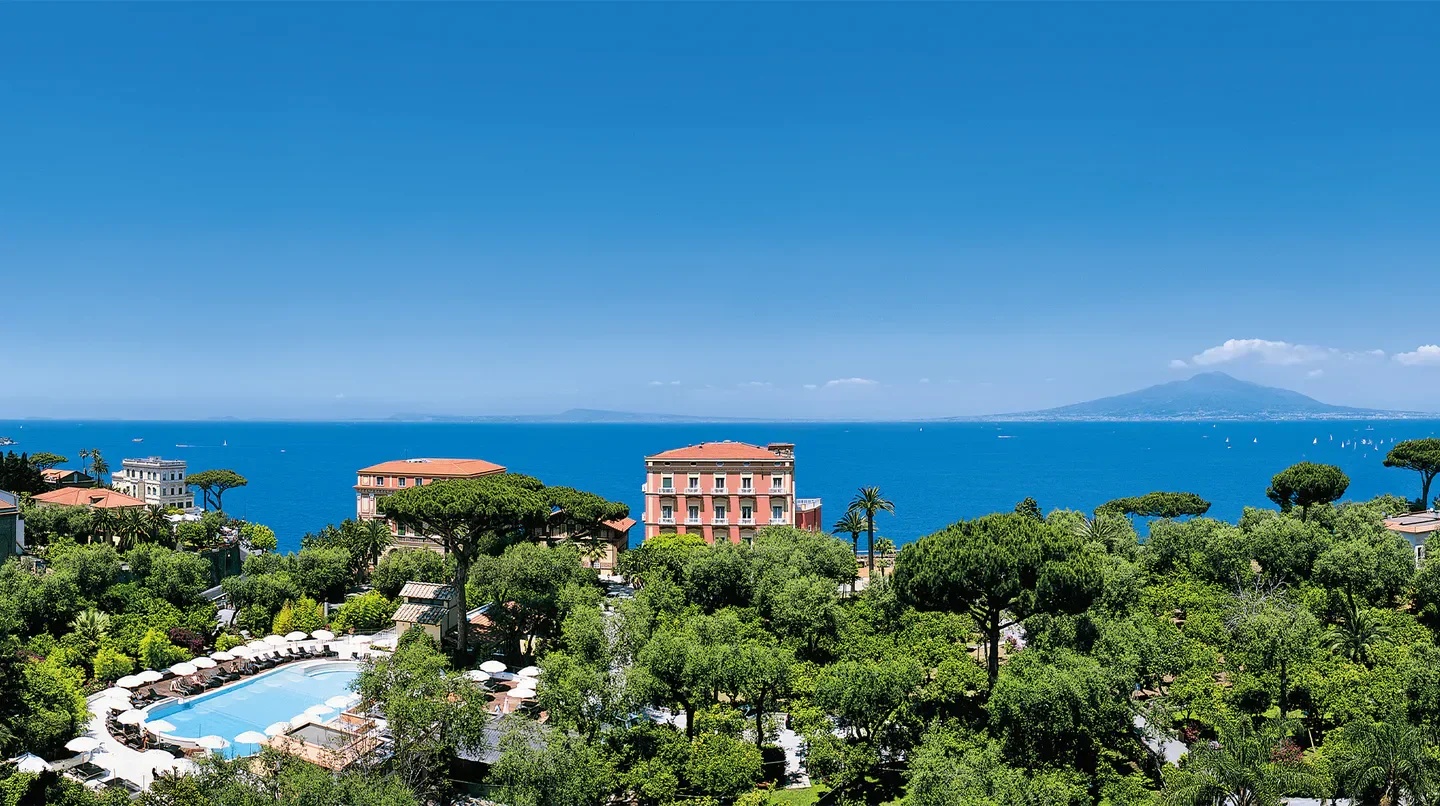 Scenic view from Grand Hotel Excelsior Vittoria in Napoli, with pool and ocean vista.