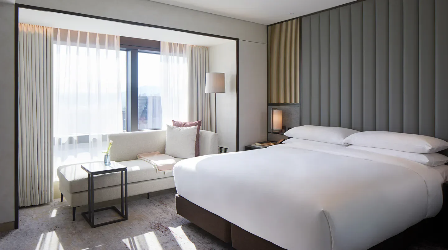 Cozy bedroom in the Grand InterContinental Seoul Parnas, a luxury hotel in Seoul.