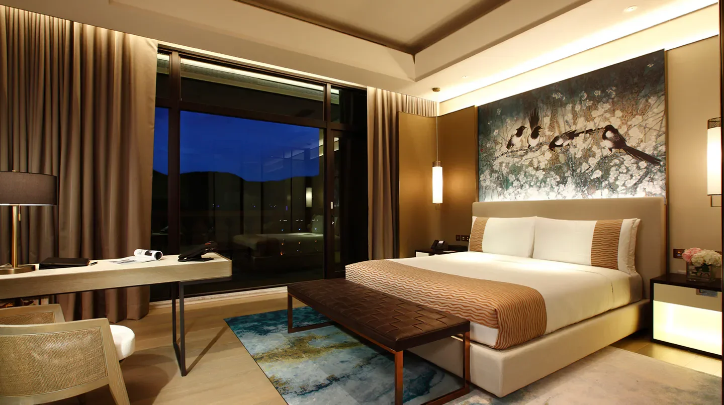 Elegant bedroom at the Grand Mayfull Hotel Taipei, featuring city views in Taipei.