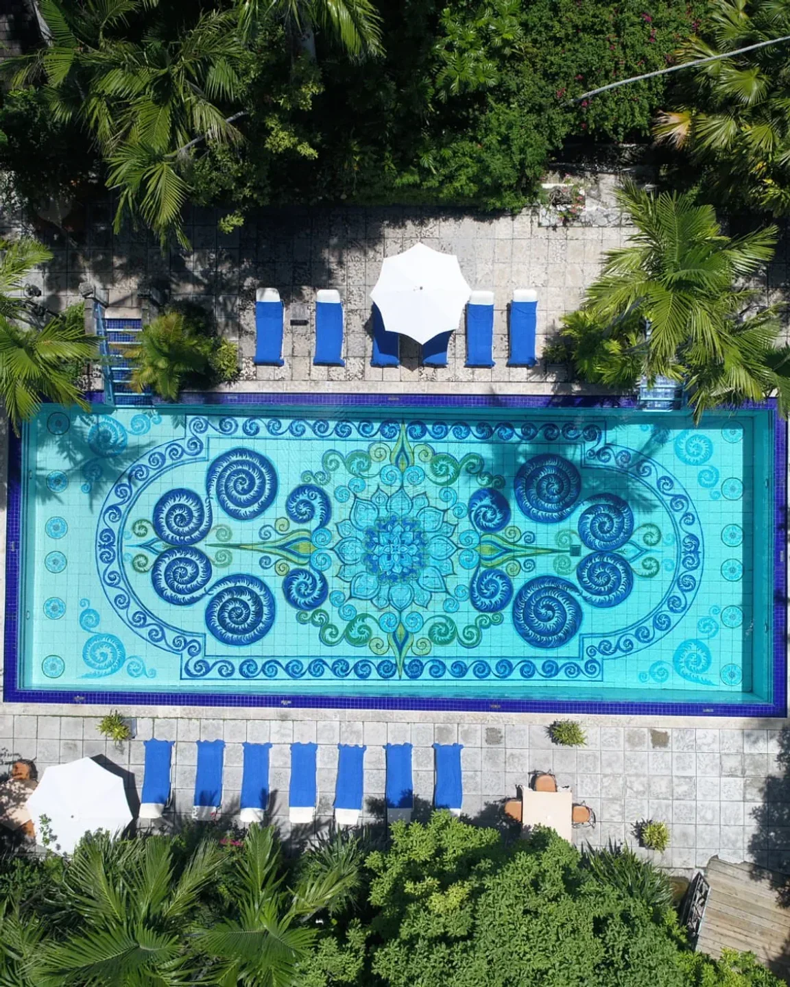 Aerial view of pool at Graycliff Restaurant in Nassau, Bahamas with vibrant mosaic design