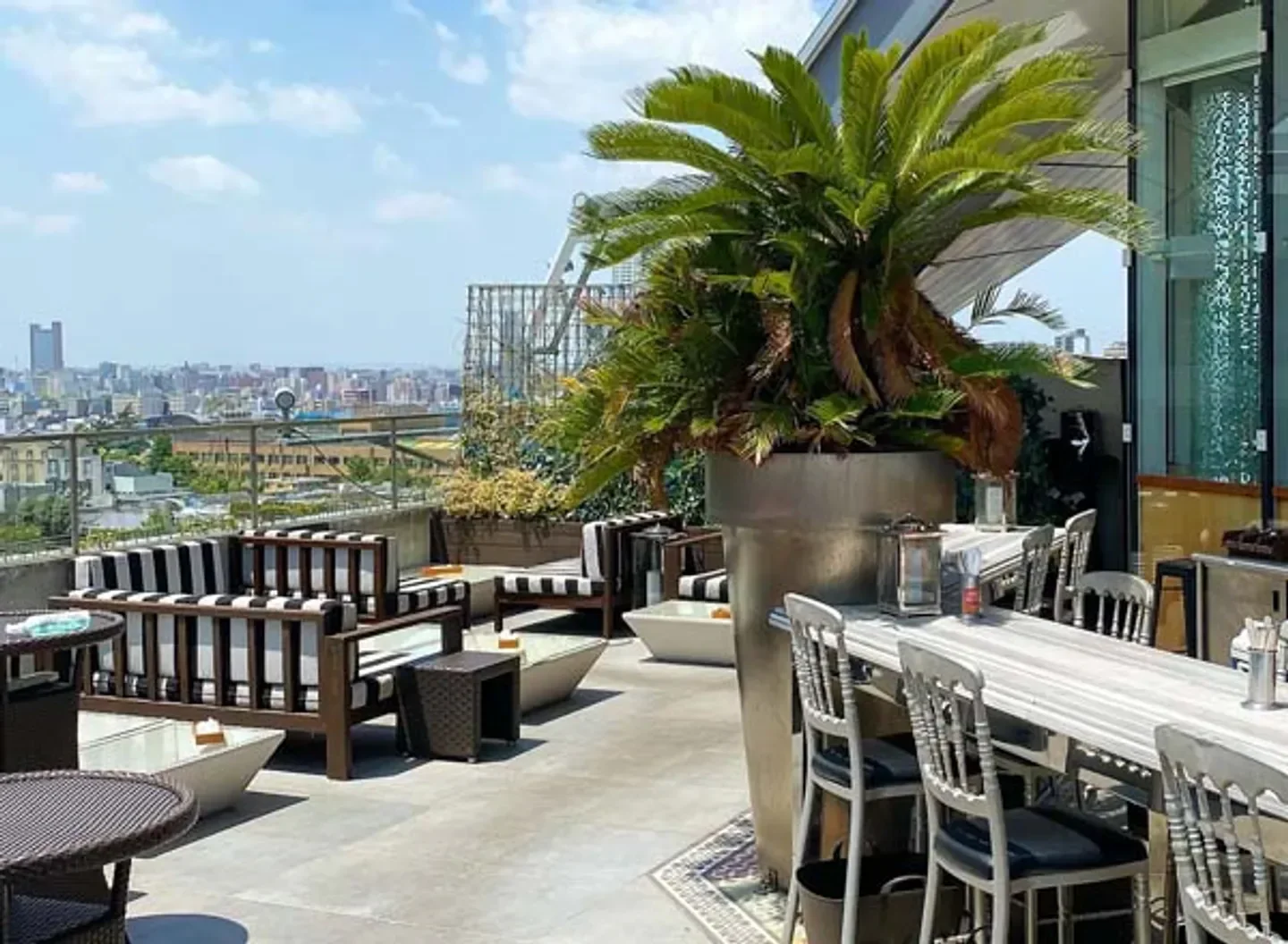 Rooftop terrace at Hacienda Del Cielo in Tokyo with city views and stylish decor