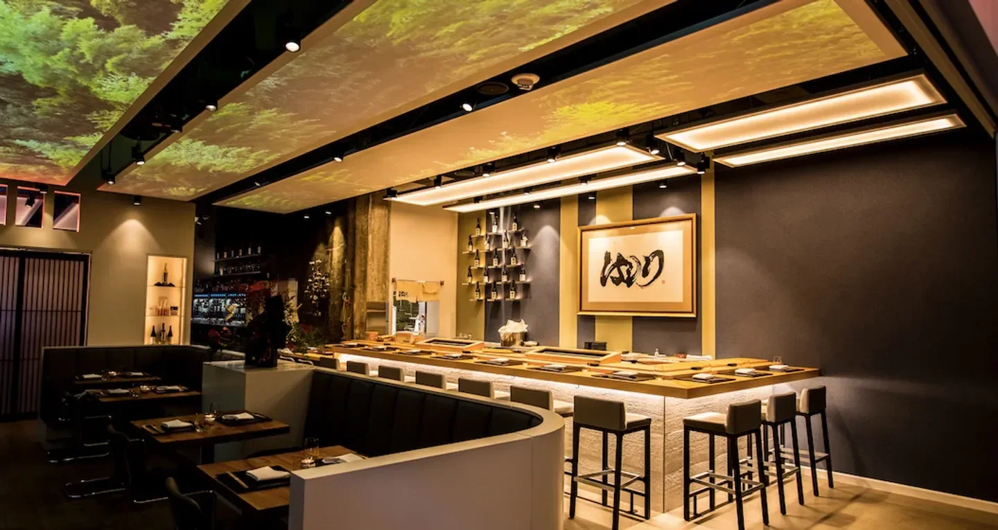 Interior of Hashiri in San Francisco: stylish sushi bar with a unique ceiling.