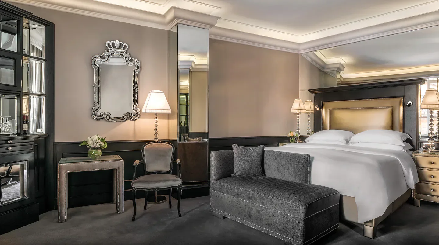Elegant bedroom at Hassler Roma hotel in Rome, with stylish decor and furnishings