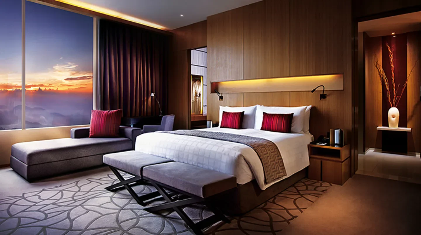 Luxury bedroom at Highlands Hotel at Resorts World Genting in Kuala Lumpur with scenic views