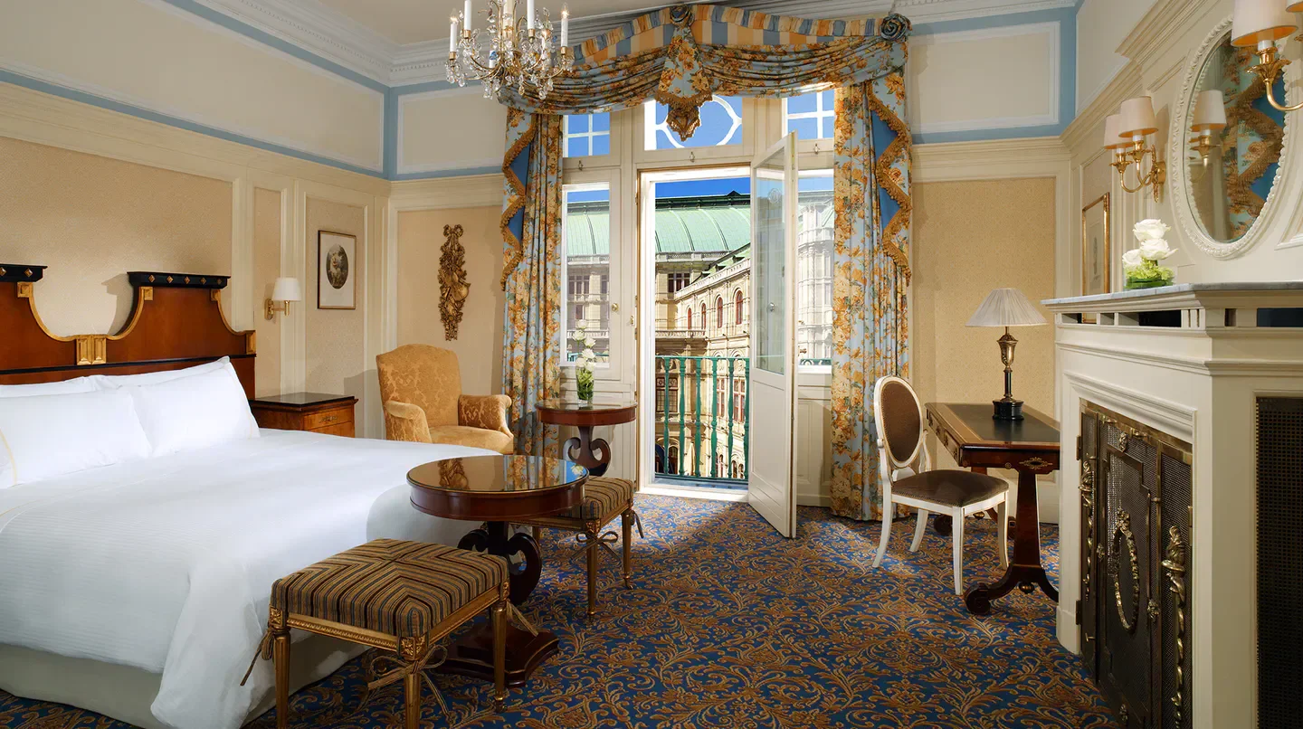Elegant room at Hotel Bristol, A Luxury Collection Hotel, Vienna, with a balcony view.