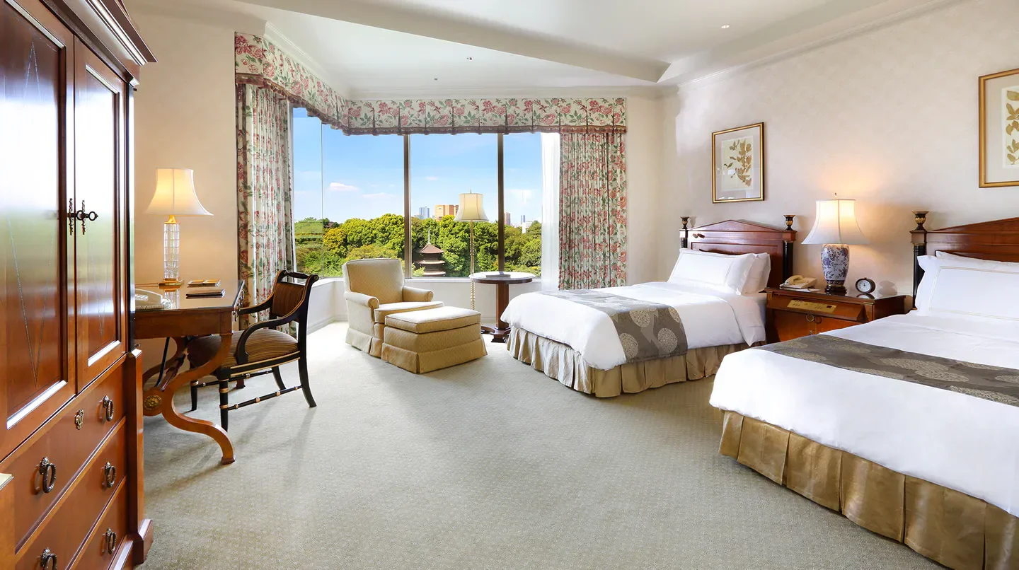 Spacious bedroom at Hotel Chinzanso Tokyo with a scenic view in Tokyo, Japan.