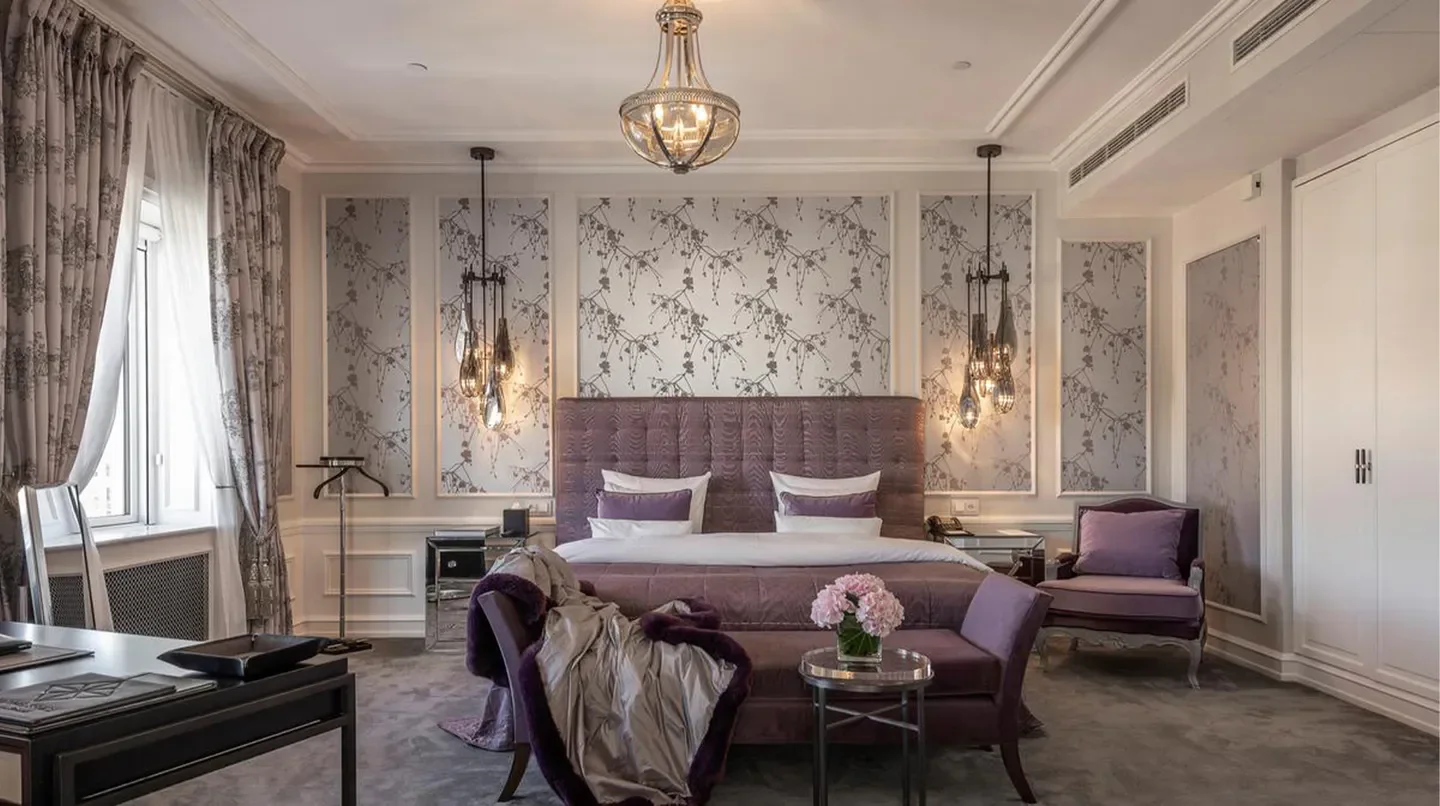Elegant bedroom at Hotel d'Angleterre Copenhagen, featuring luxury design and ornate lighting in Copenhagen.