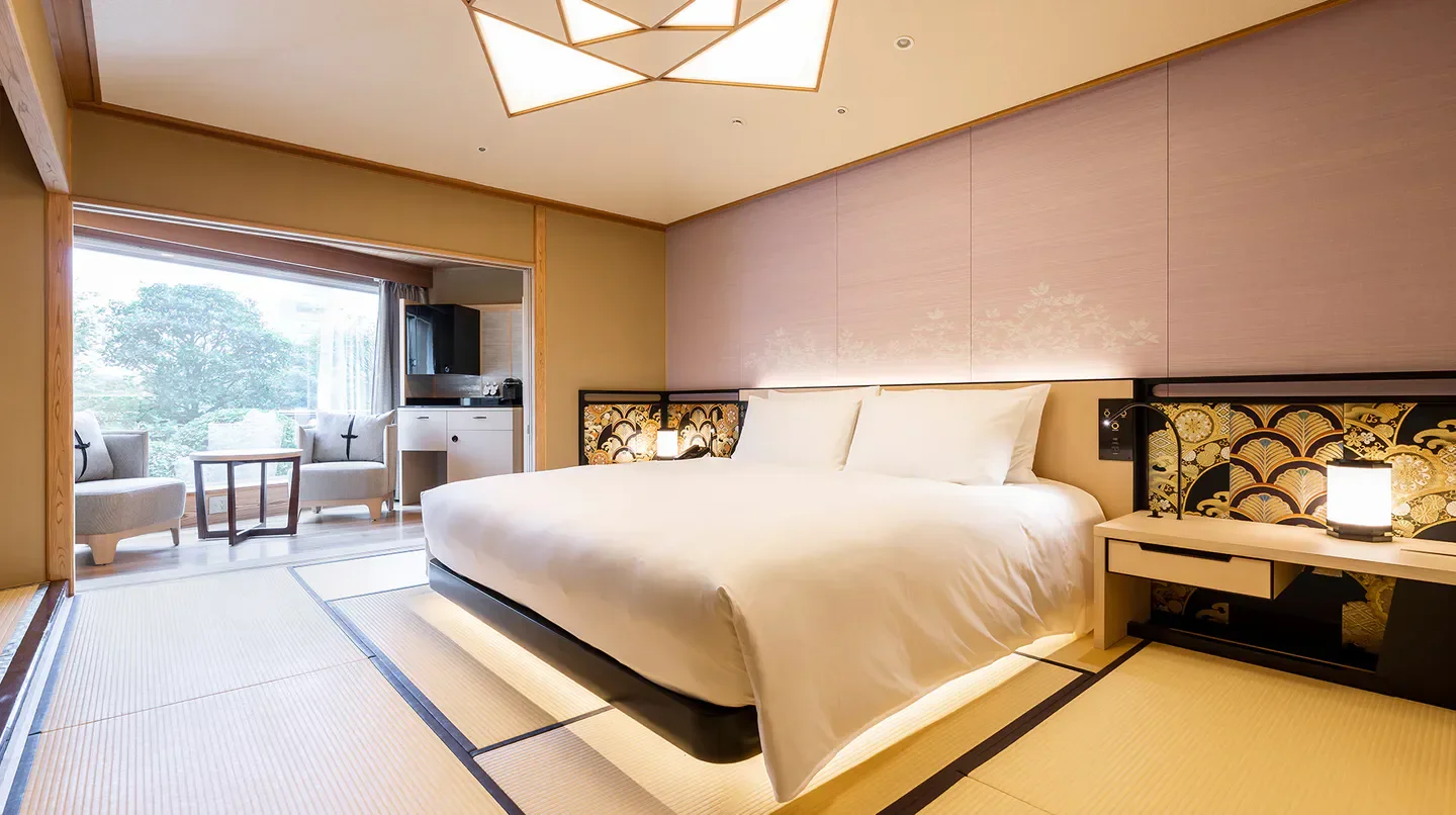 Elegant bedroom at Hotel Gajoen Tokyo, featuring traditional Japanese design and Tokyo views.