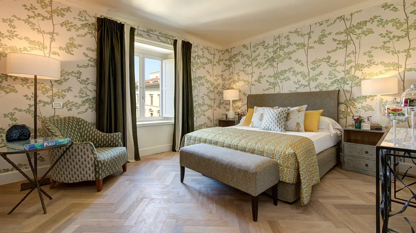 Cozy bedroom at Hotel Savoy, a Rocco Forte Hotel, with views of Florence.