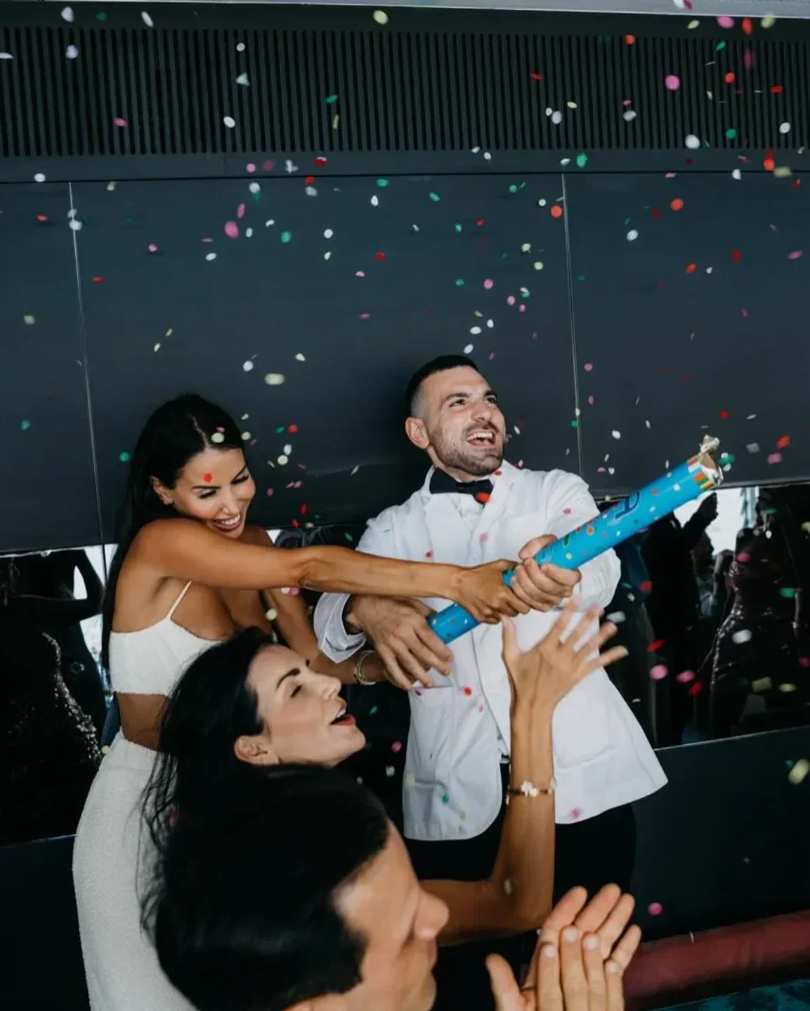 Celebration at Icebergs Dining Room & Bar in Sydney, confetti celebration with happy guests.