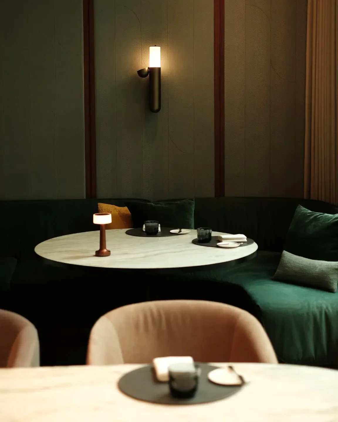 Cozy dining area at IGNIV Bangkok restaurant, featuring stylish decor in Bangkok.