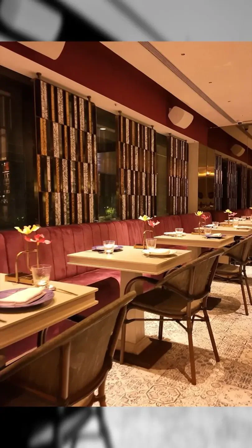 Cozy dining area at Inada restaurant in Nara, featuring elegant decor and lighting.