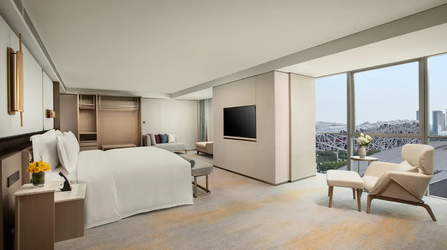 Modern hotel room at InterContinental Beijing Beichen with city views in Beijing.