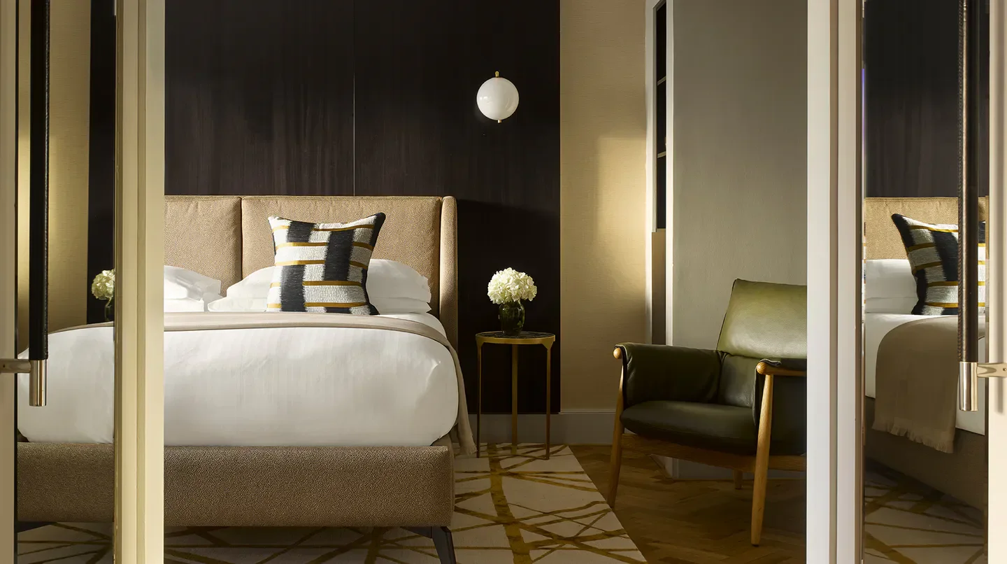 Elegant bedroom at the InterContinental London Park Lane hotel, London, with stylish decor.