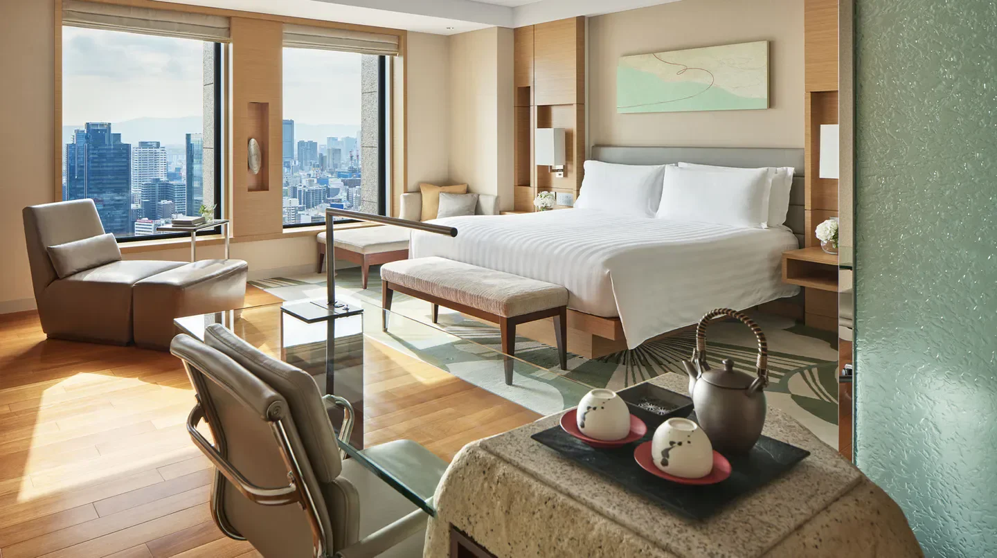Luxury room with city views at InterContinental Osaka, featuring tea set.