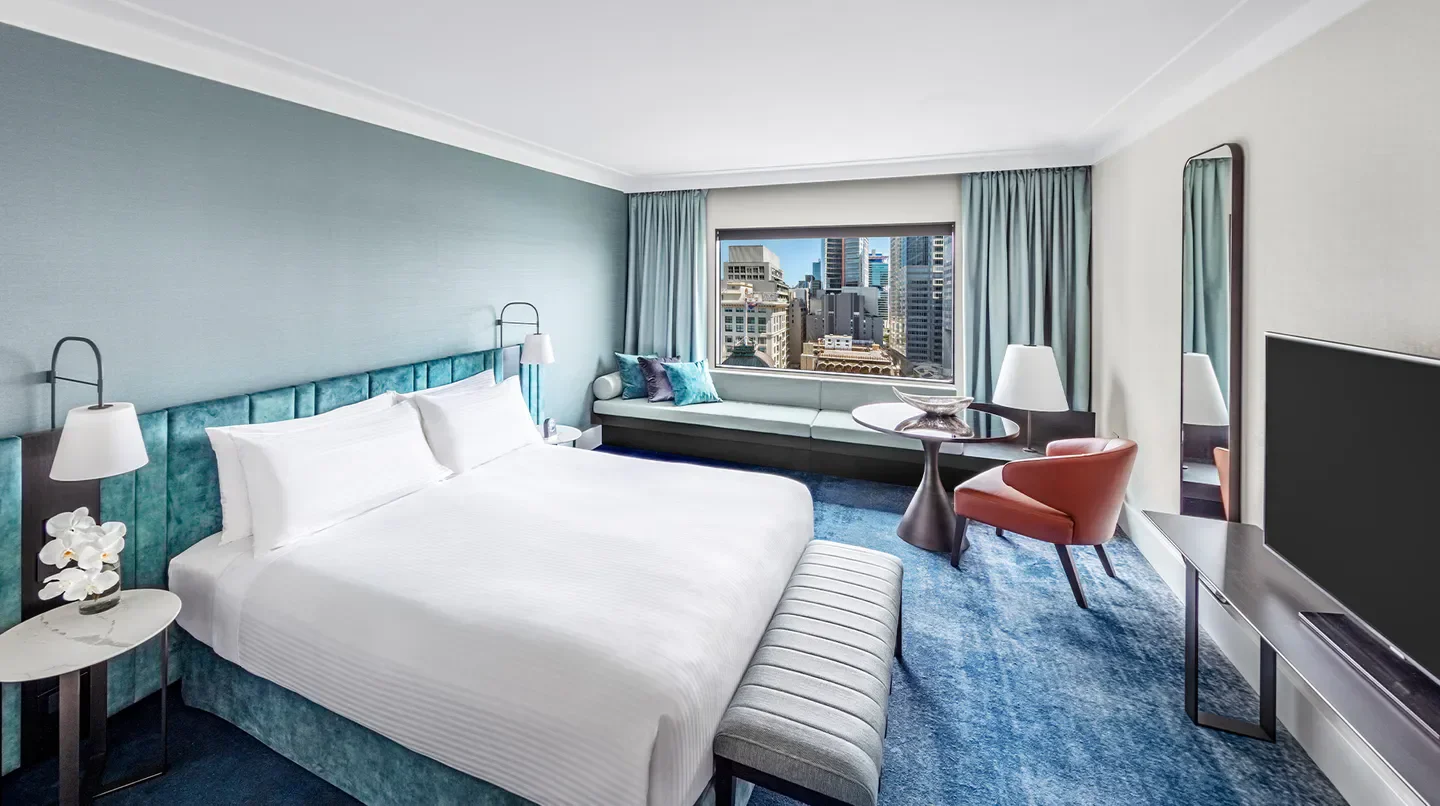 Stylish hotel room with city views at the InterContinental Sydney hotel in Sydney.
