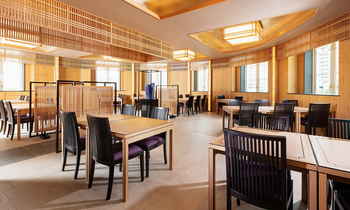 Interior dining at Iroha in Osaka, featuring wooden accents and inviting ambiance