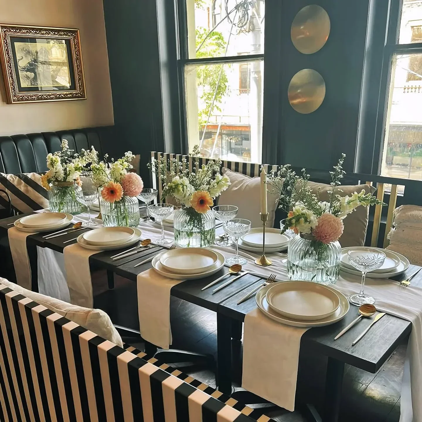 Elegant dining table setting at ISH Restaurant in Melbourne with flowers and fine dining details.