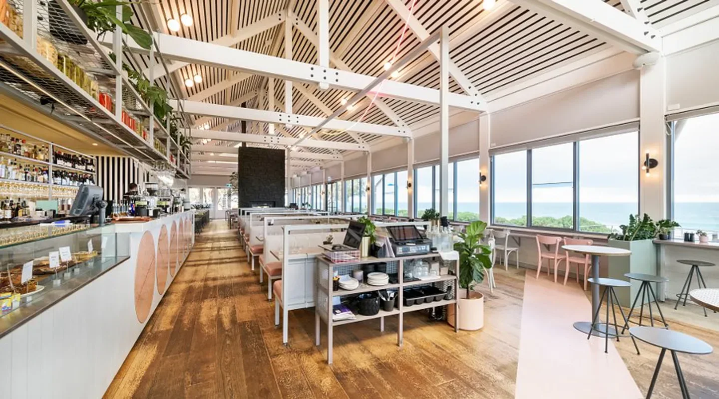 Interior of Island Market restaurant in Perth with ocean views, tables, and bar