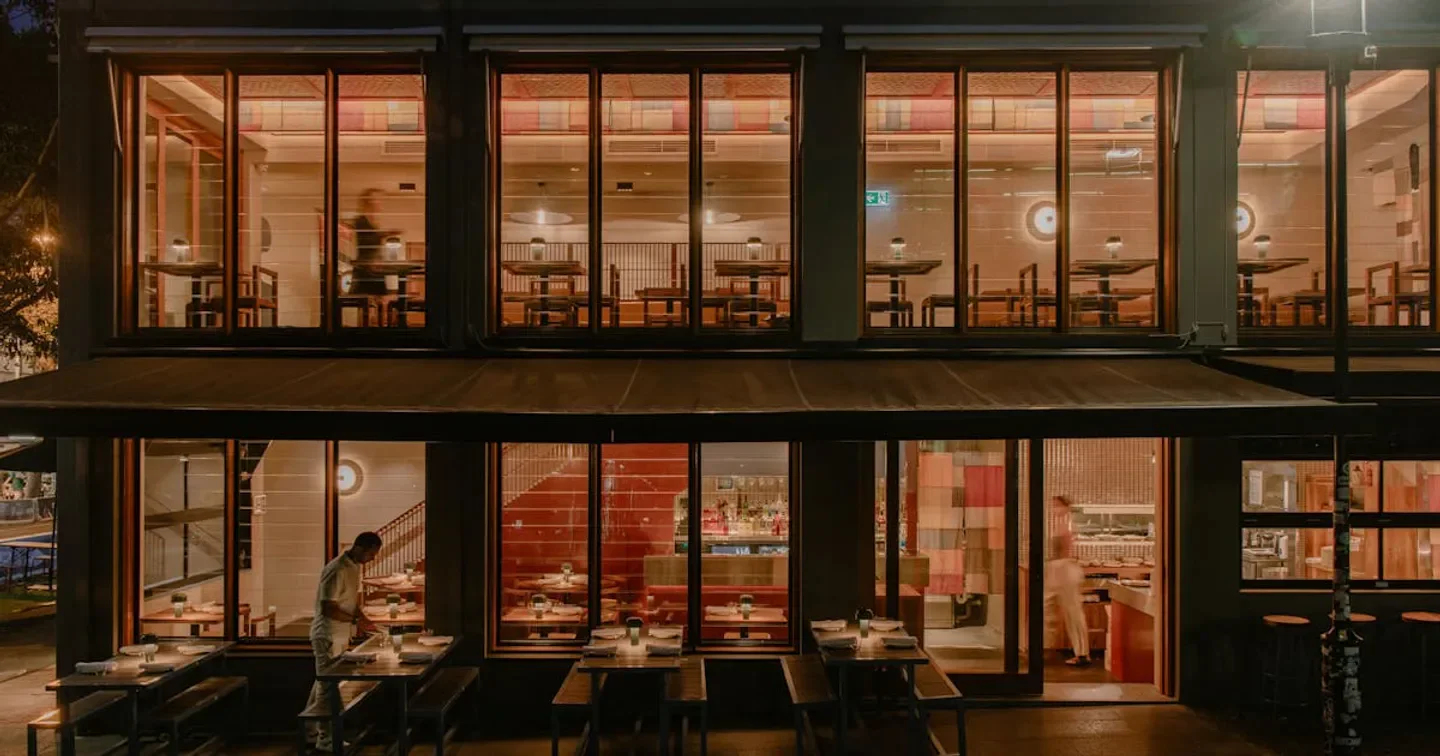 Exterior view of Itō restaurant in Sydney with warm lighting and inviting atmosphere.