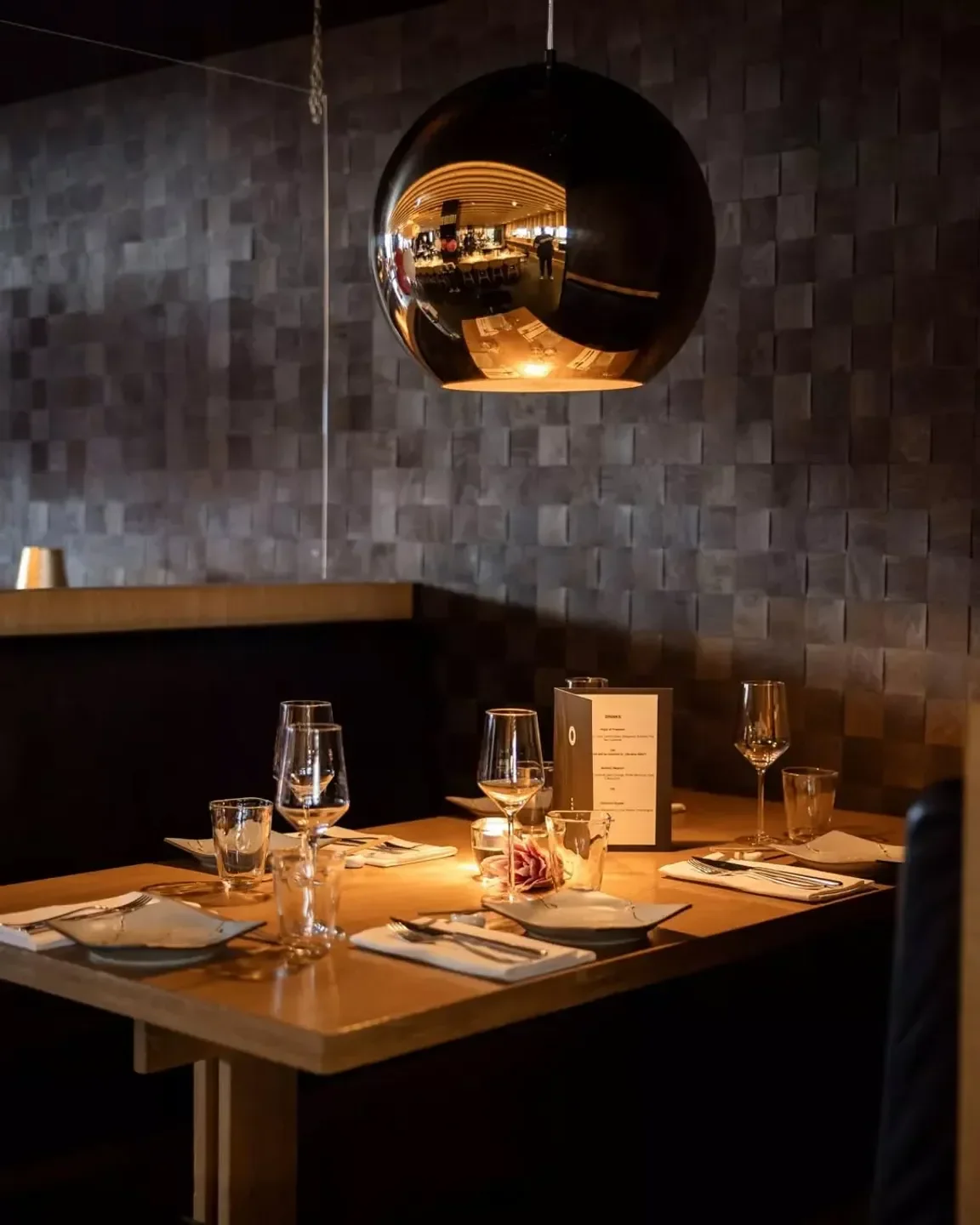Cozy dining table at Izakaya restaurant in Ibiza with elegant lighting and decor