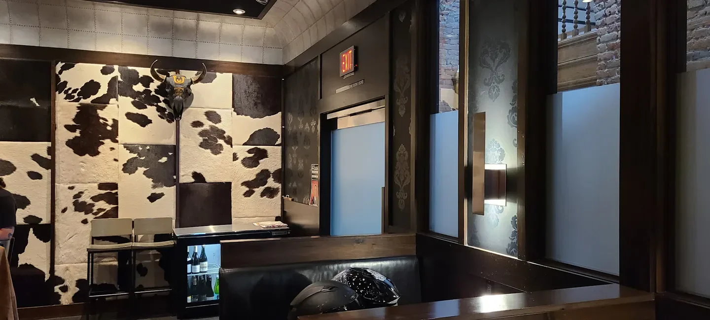 Interior of Izakaya Three Fish in Southern Montana, featuring cowhide wall décor.