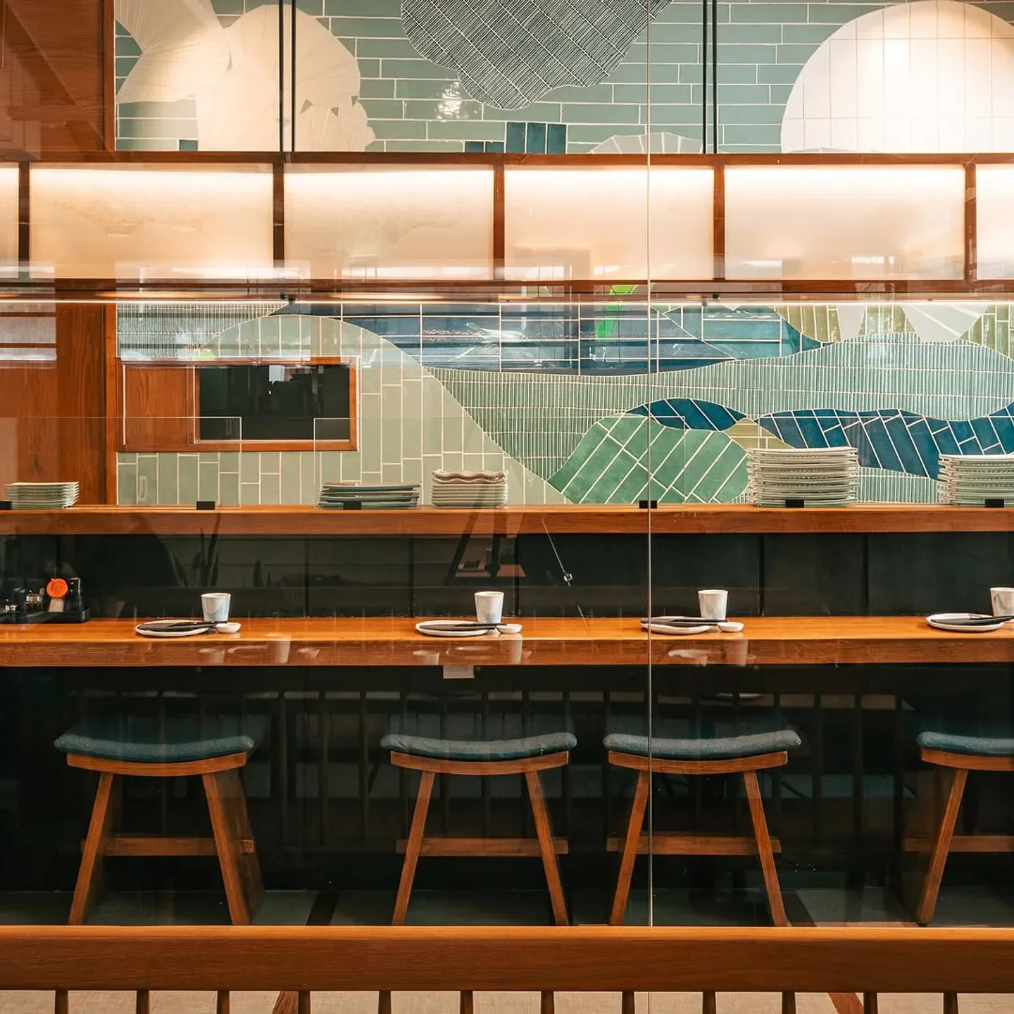 Interior of Izumi Bandra restaurant in Mumbai, showcasing stylish seating and design.